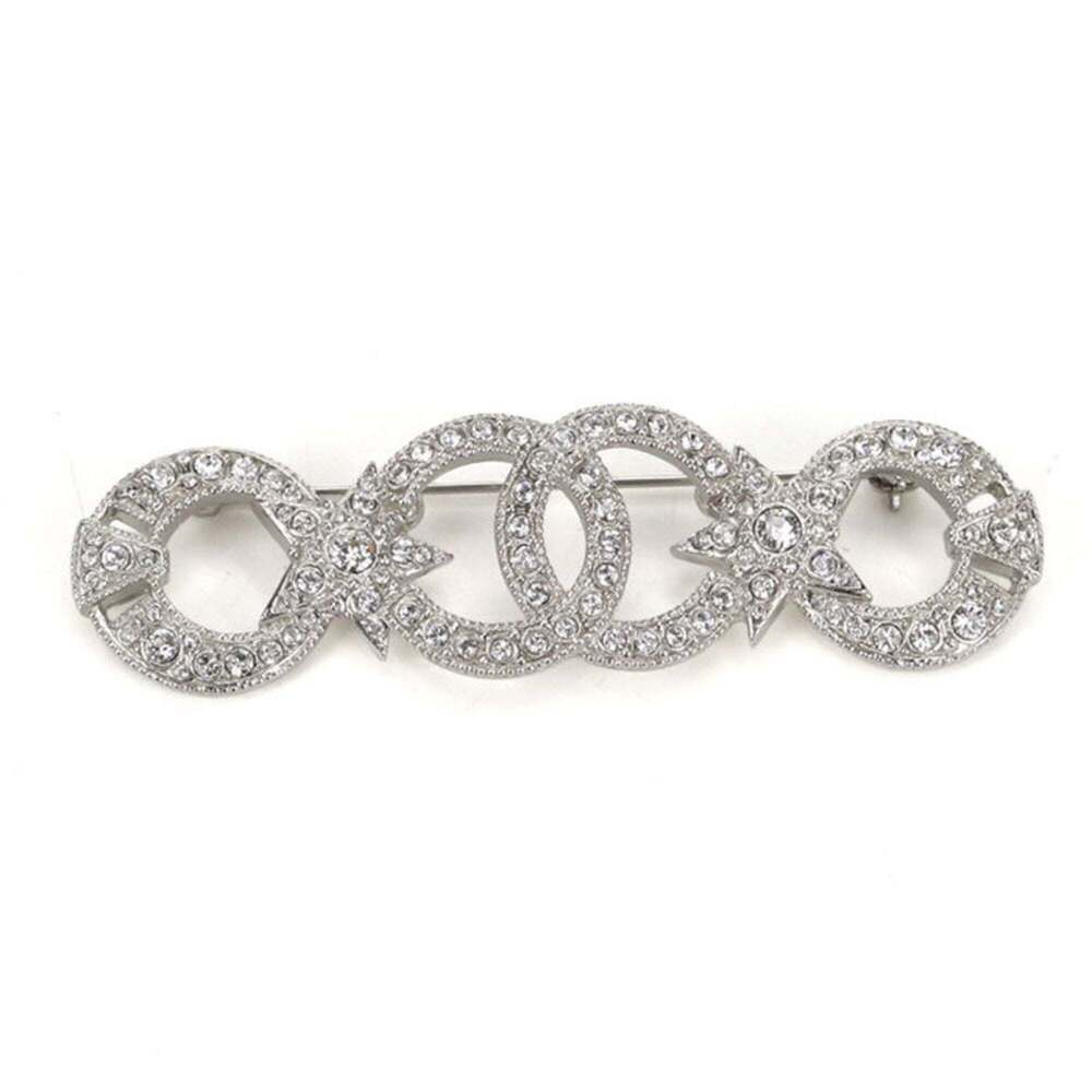 CHANEL Silver Logo Brooch - Picture 1 of 4